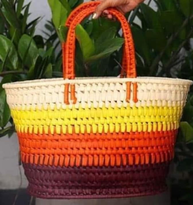 Crochet Baskets — orange-handled example