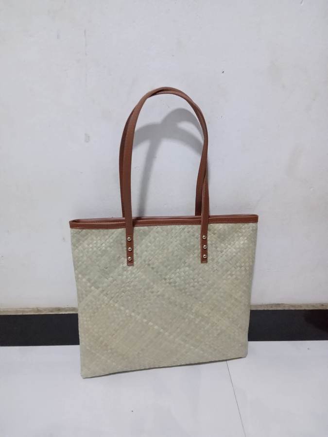 Pale natural woven tote with leather binding and long straps by Magampura Handicrafts, reference A8