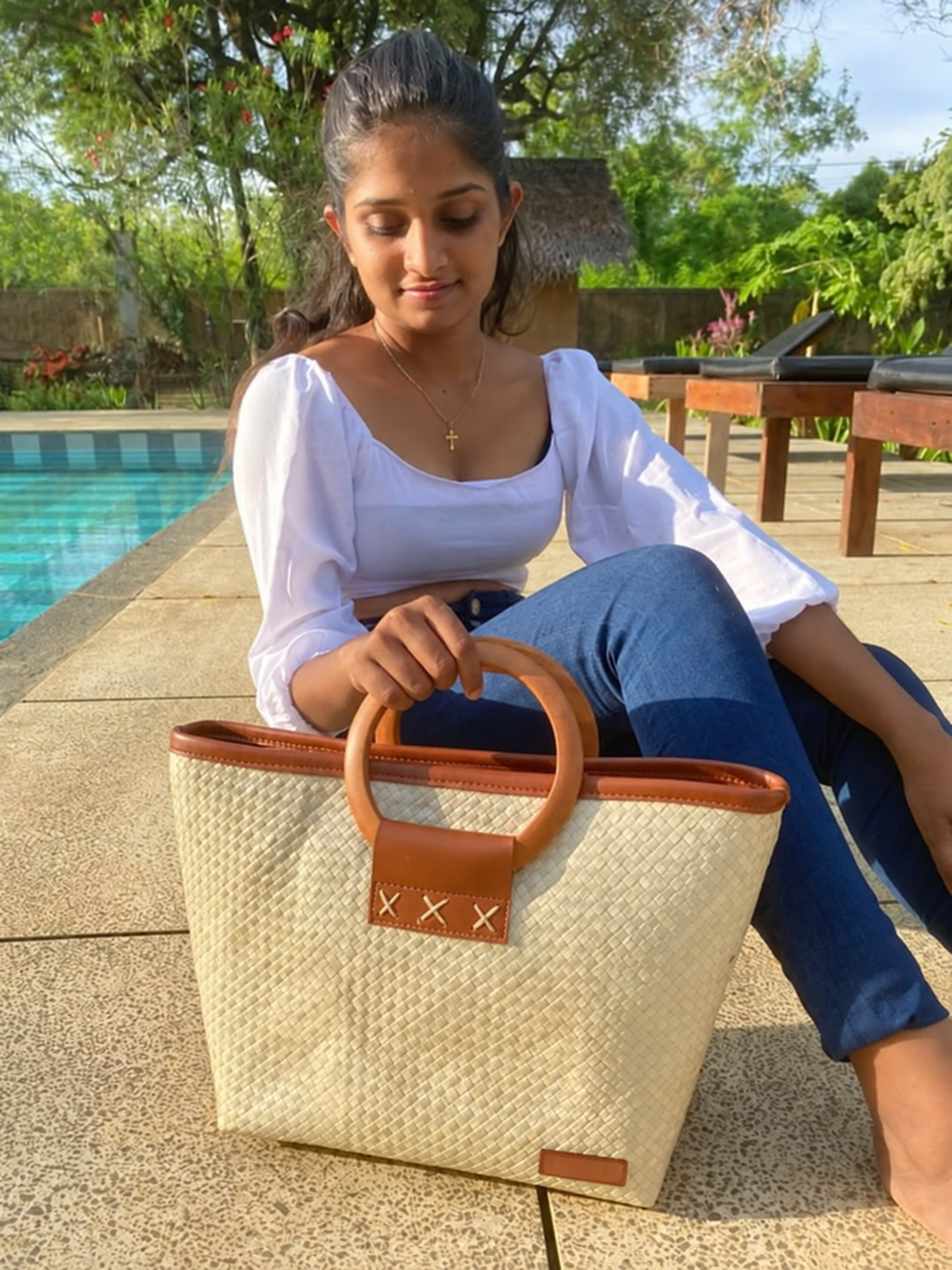 Tote with Wooden Ring Handles and Leather Top Trim — poolside lifestyle view